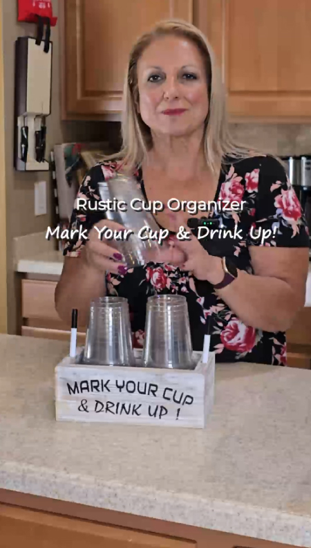 Wood double cup holder with “Mark Your Cup and Drink Up” text and two marker slots — perfect for organizing disposable cups at parties.