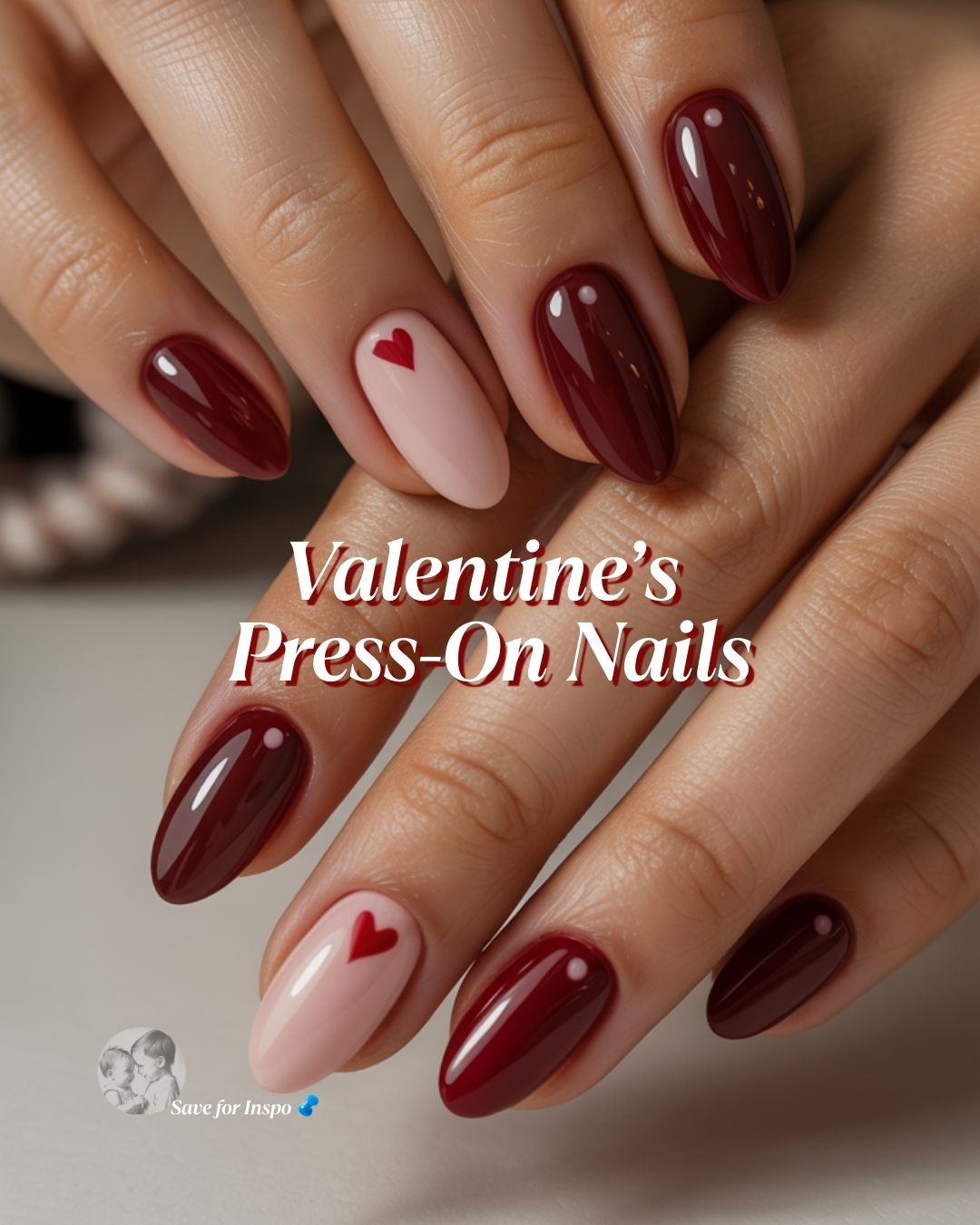 Press-on Valentine’s Day nails for grown women featuring red and blush tones with glossy finishes.