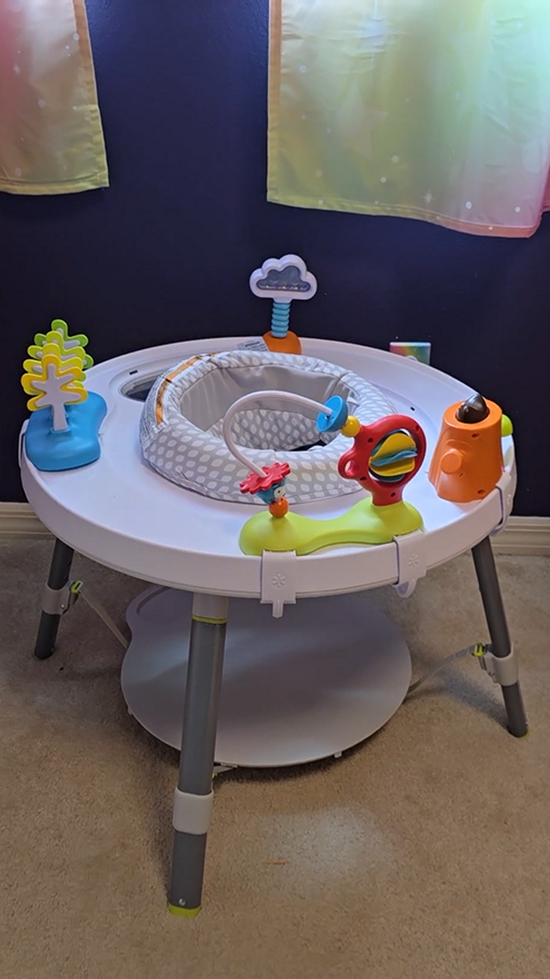 Skip Hop baby activity center with toys for early development in girls room makeover